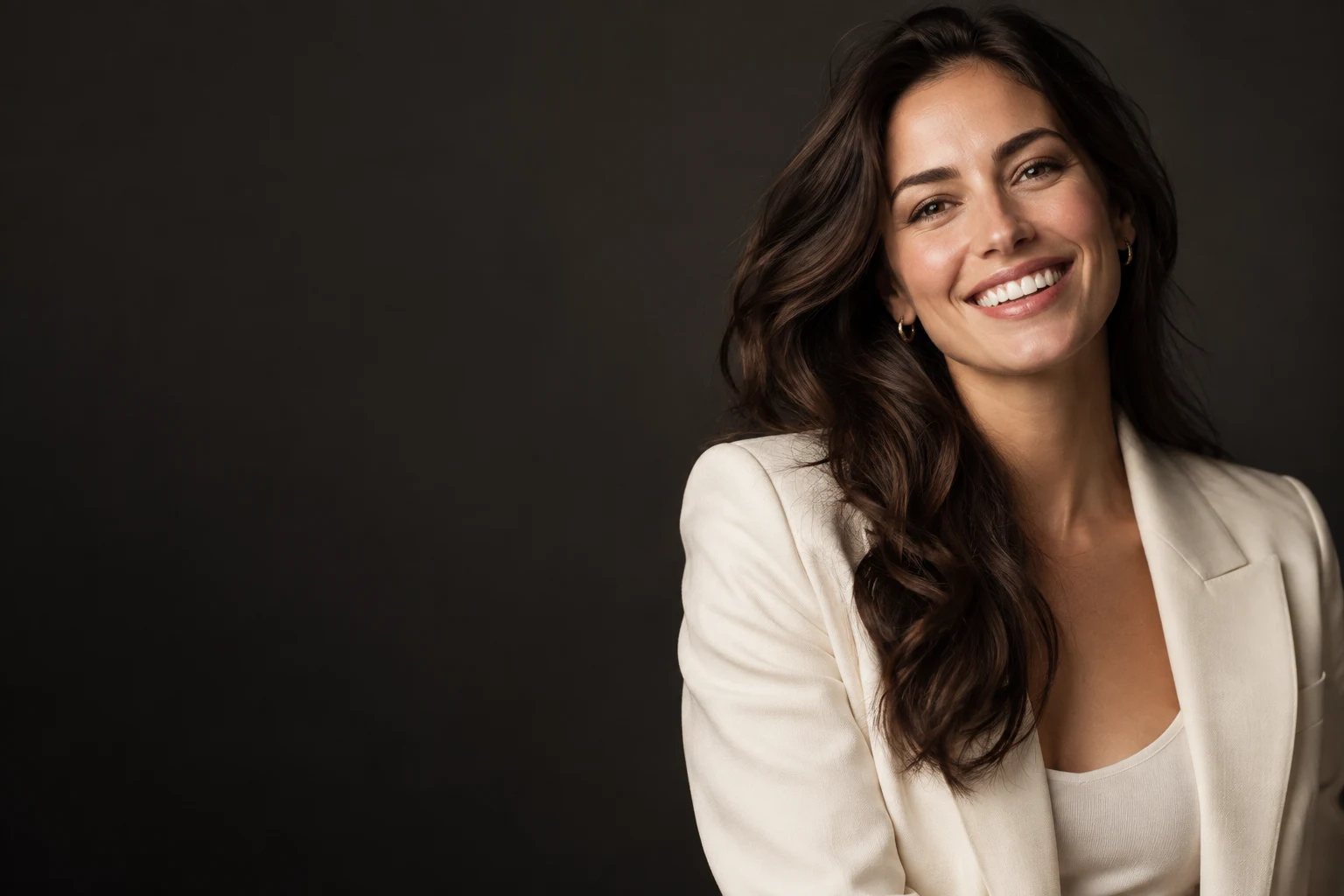 Illustrative campaign model smiling; not an Atlas patient or treatment result
